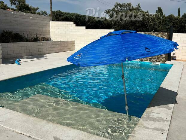 Piscina con playa