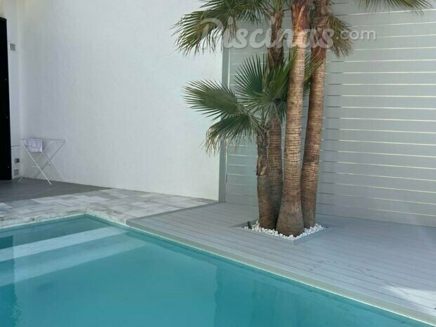 Construcción de piscina y entorno