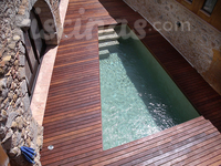 Piscines con tarima de madera