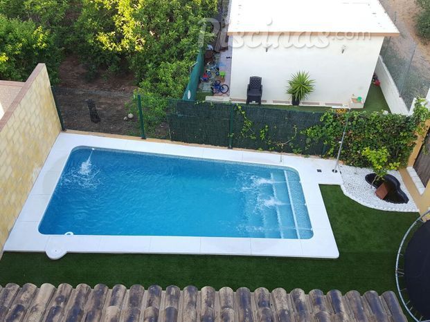 Piscina de 6,5 x 3 con escalera interior 